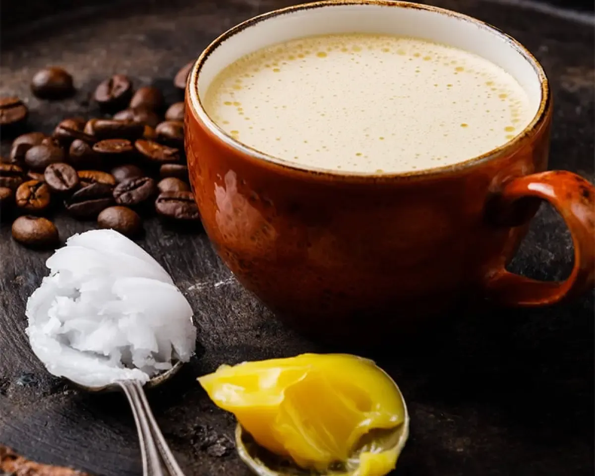bulletproof coffee with coffee beans and butter
