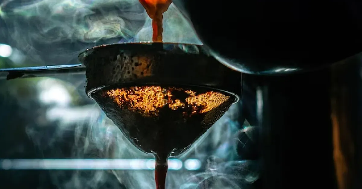 Pouring coffee through a filter