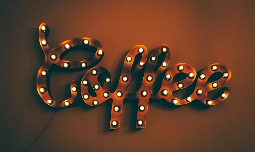 Lightbulb sign saying coffee