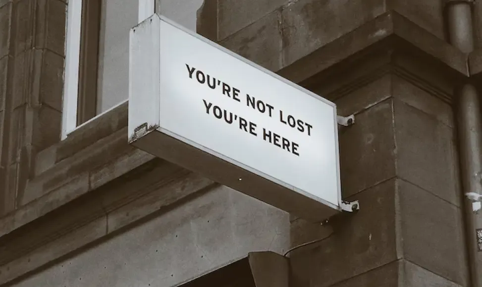 Sign saying - you are not lost, you are here