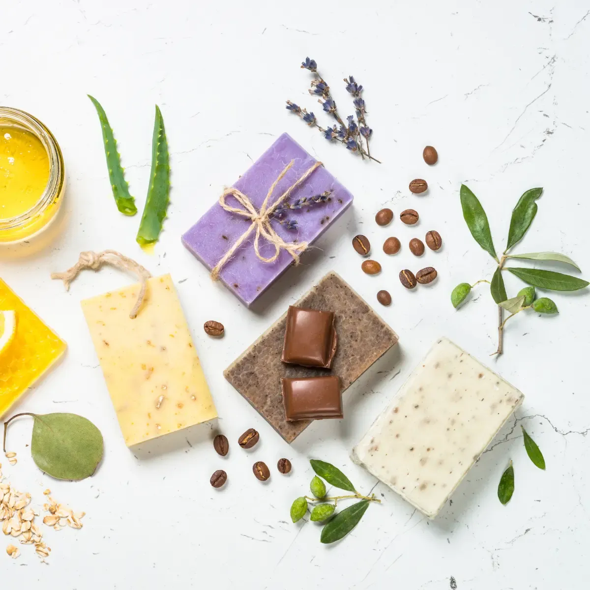 four different soaps: aloe vera, lavender and coffee scented