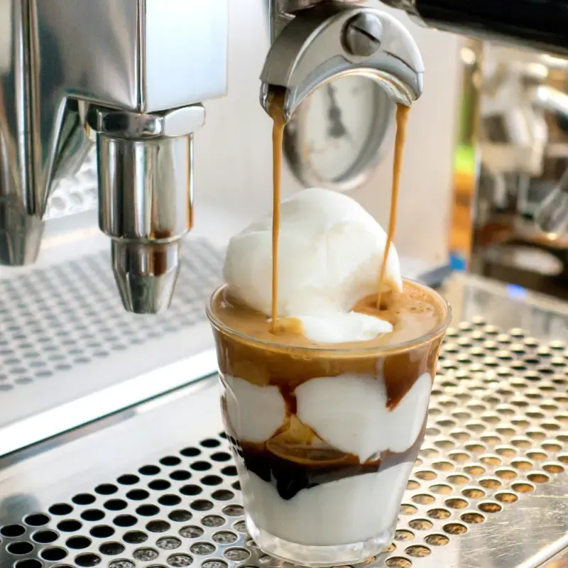 Espresso pouring into a cup