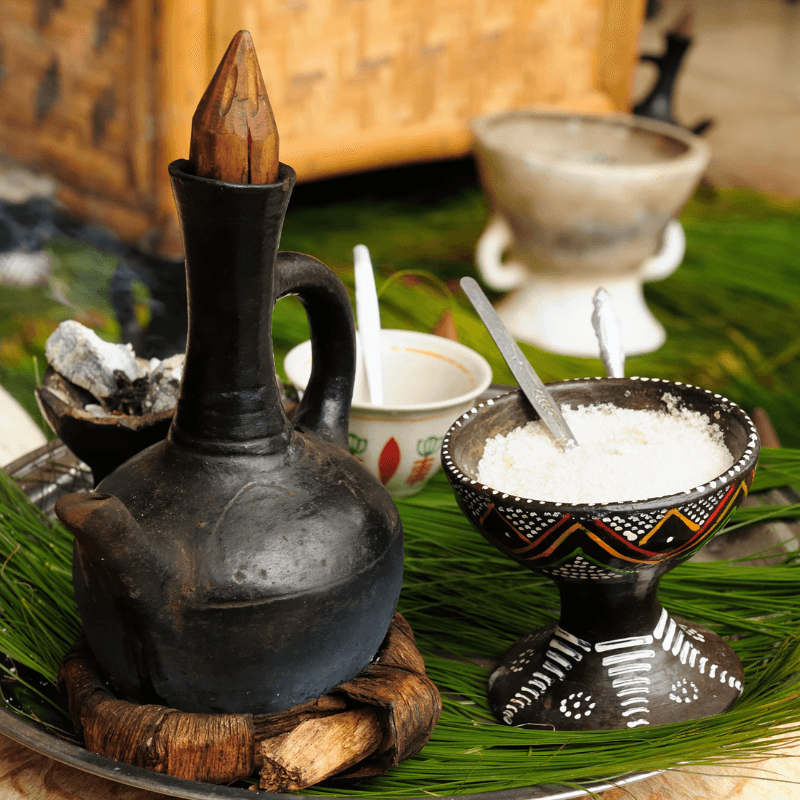 African coffee carafe with a pot of sugar