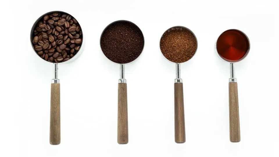Measuring cups with coffee