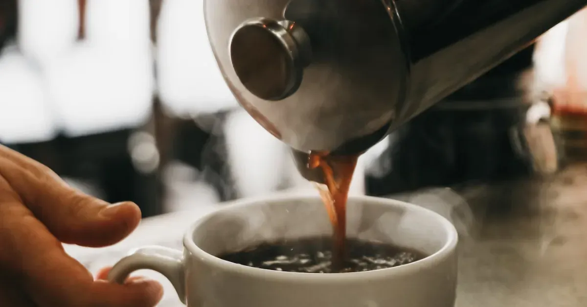 Pouring coffee from a french press