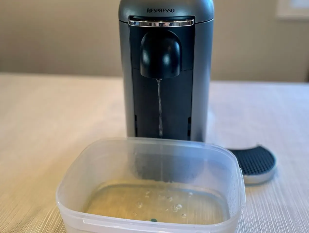 nespresso machine in descaling process