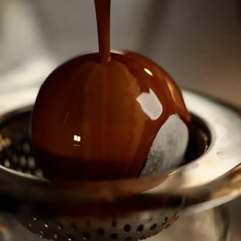 Espresso being poured on a cooling rock