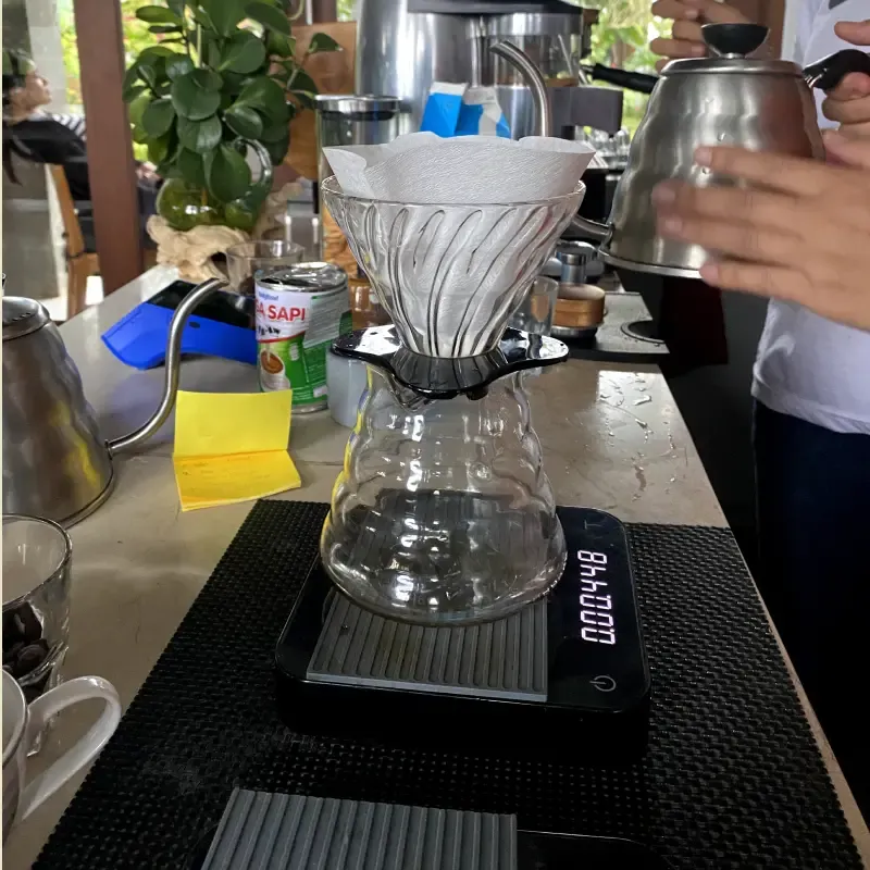 Pour over methos shown with a carafe and a pour over coffee maker