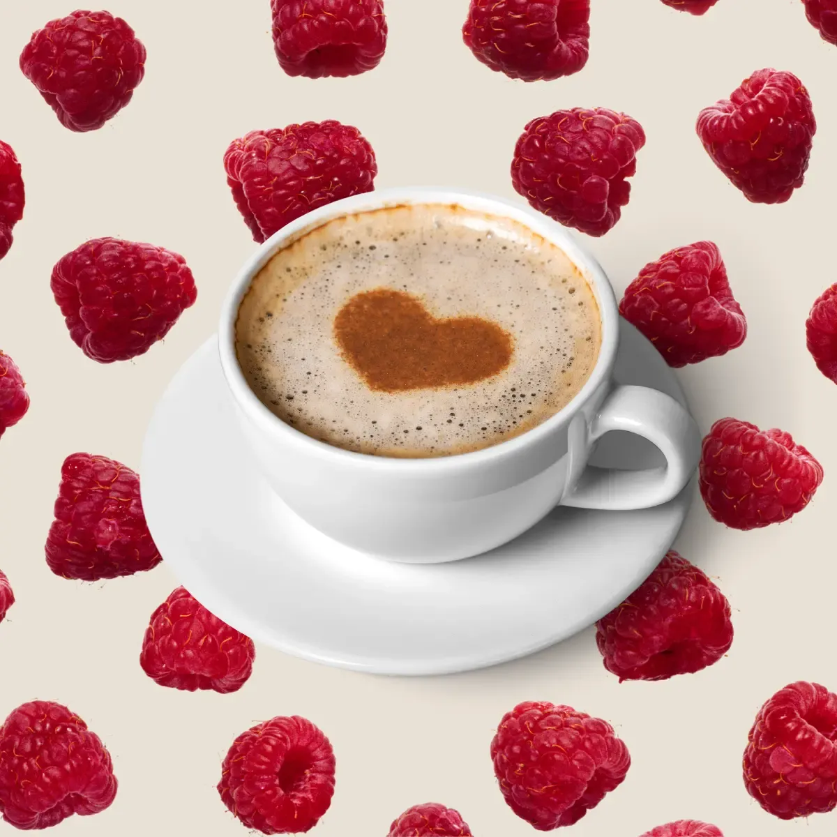 Cup of coffee in front of a background of raspberry falling