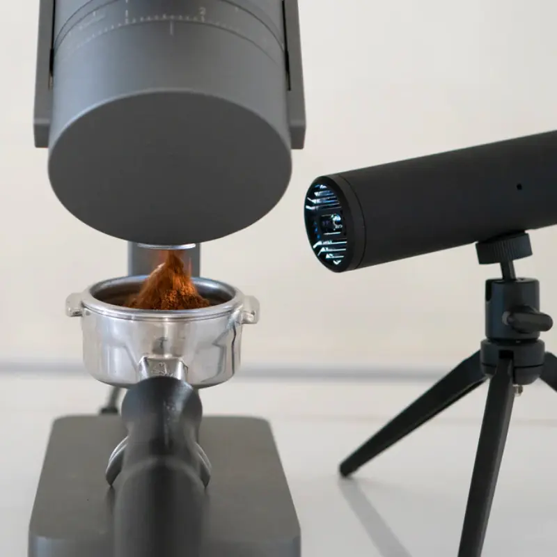 Acaia Ion Beam in action - showing how grinding coffee with the beam removes statics