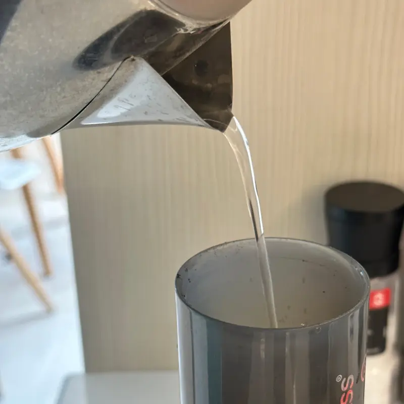 Pouring hot water into an Aeropress