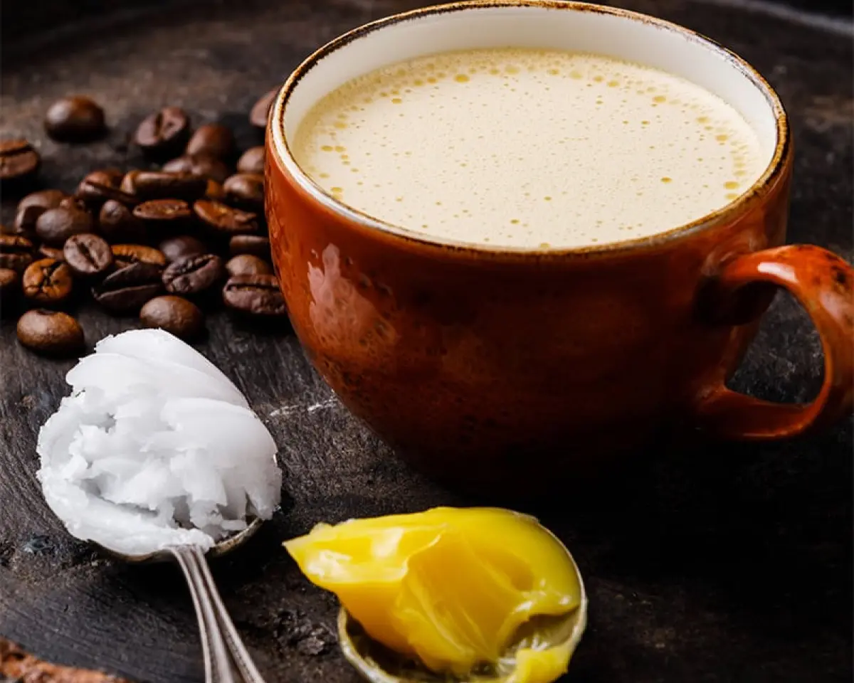 bulletproof coffee with coffee beans and butter
