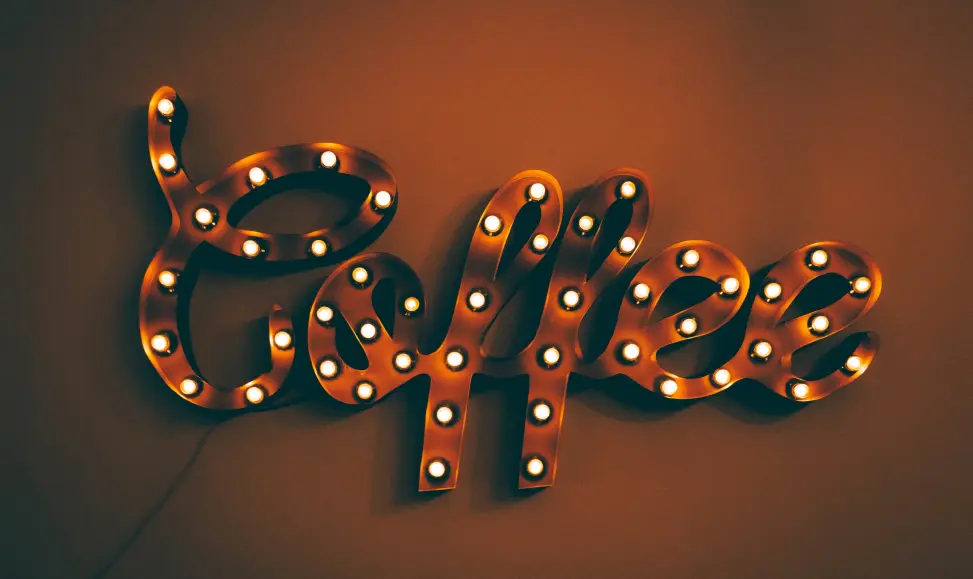 Lightbulb sign saying coffee