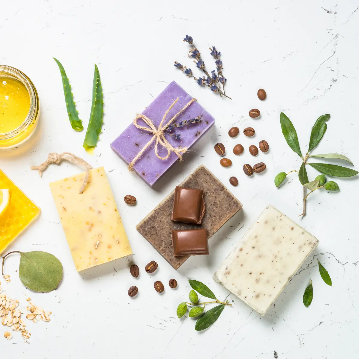 four different soaps: aloe vera, lavender and coffee scented