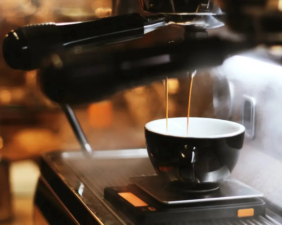 espresso machine pouring coffee in a cup