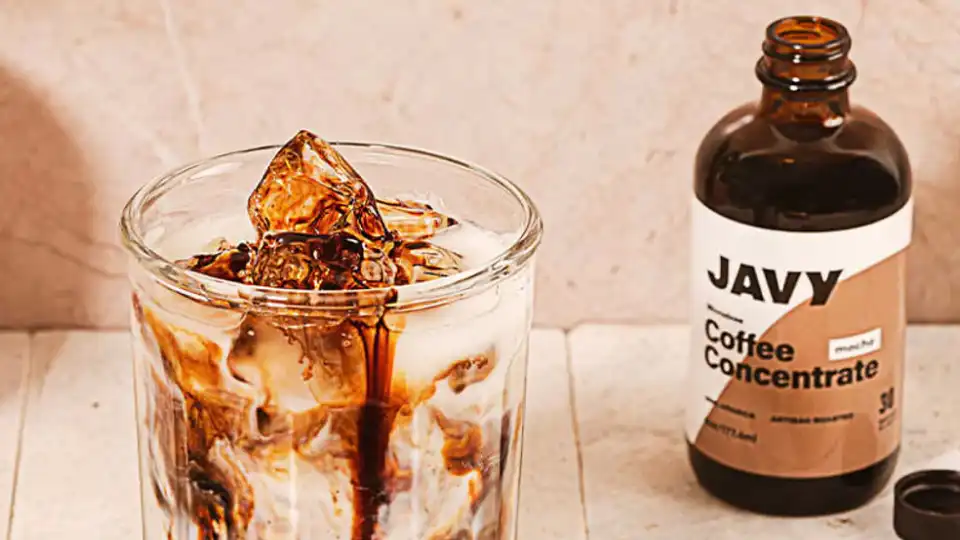 Decaf coffee concentrate poured into a glass