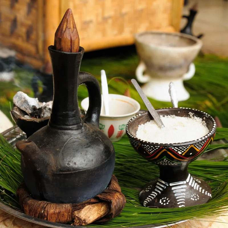 African coffee carafe with a pot of sugar