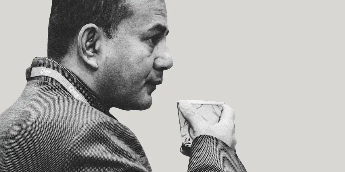 Man drinking a cup of coffee