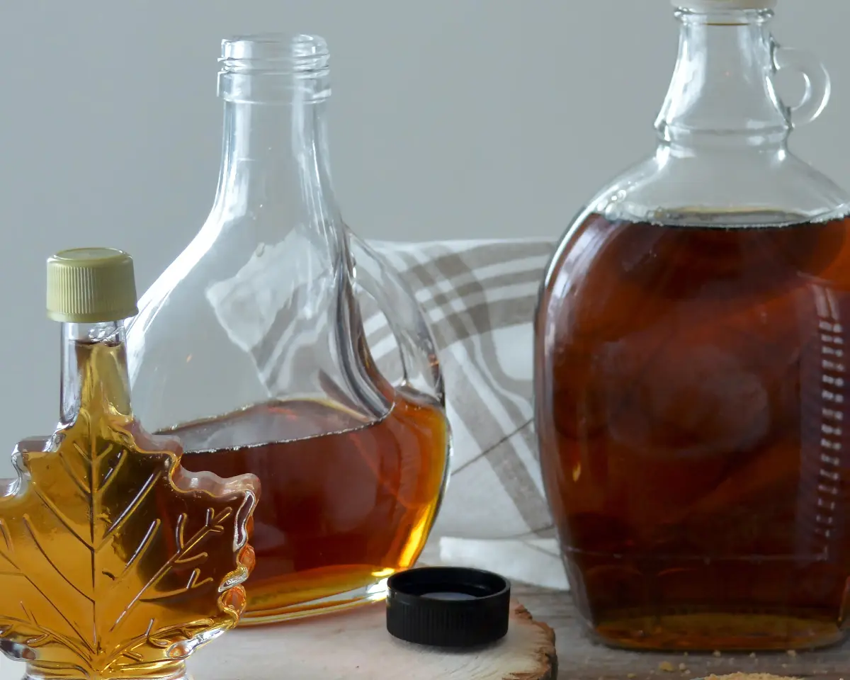 Three bottles of maple syrup