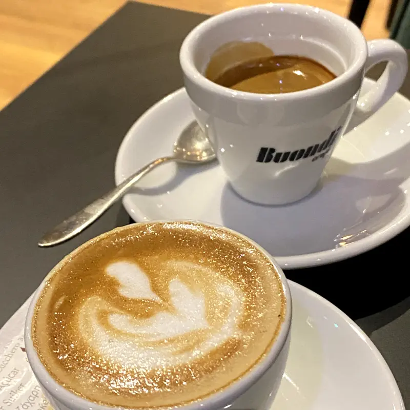 A macchiato and an espresso side by side