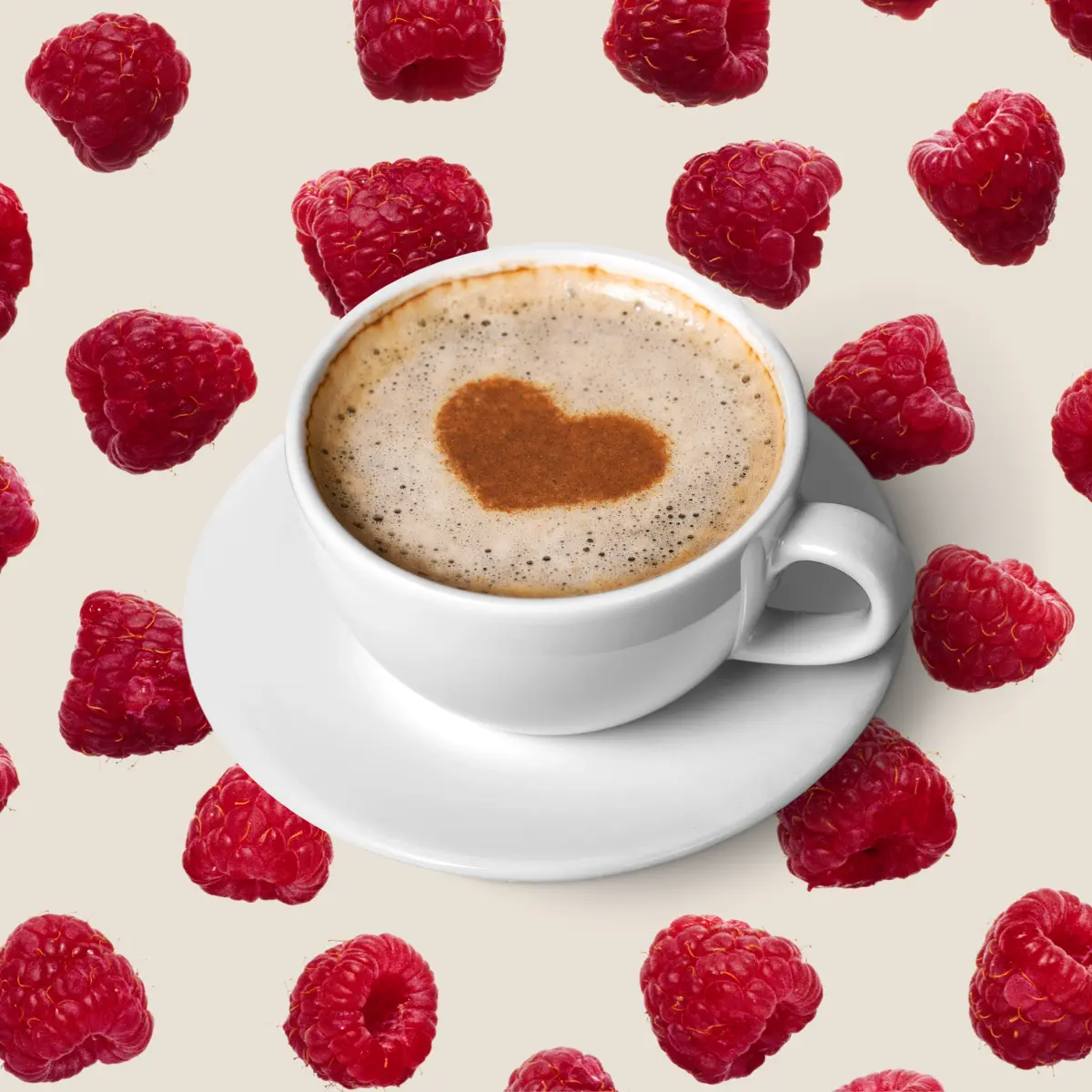 Cup of coffee in front of a background of raspberry falling
