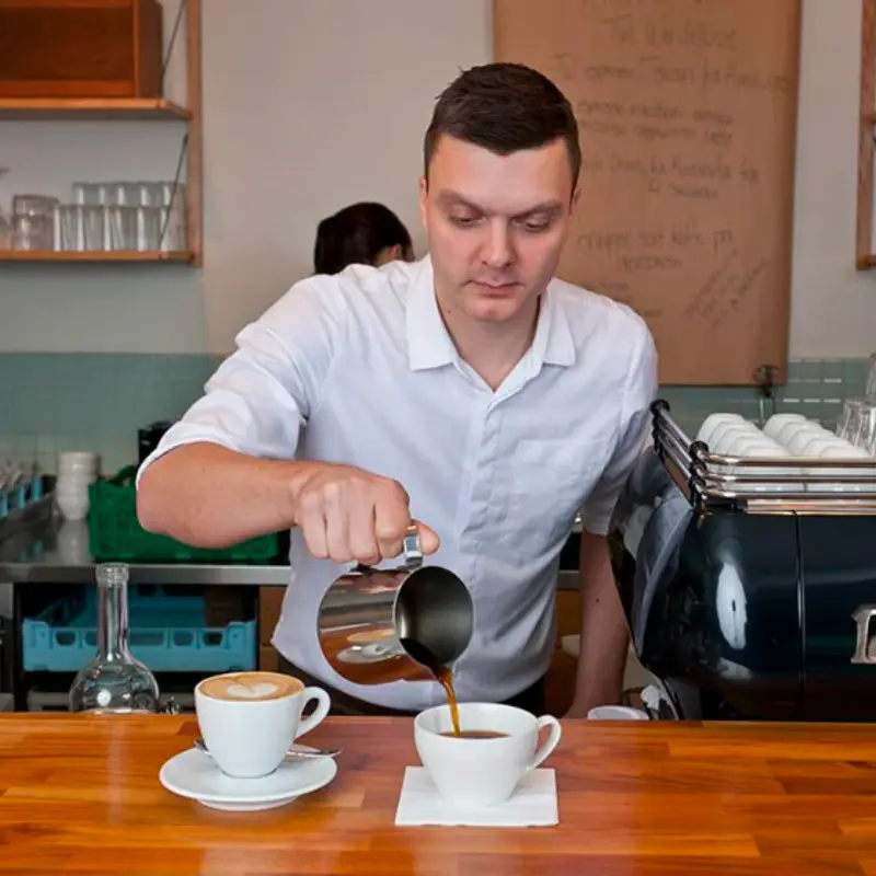 Tim Wendelboe pouring coffee into a cup