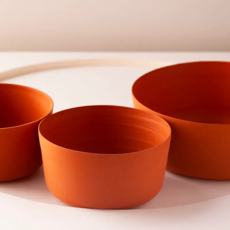 Cups and bowls made out of clay in different shapes