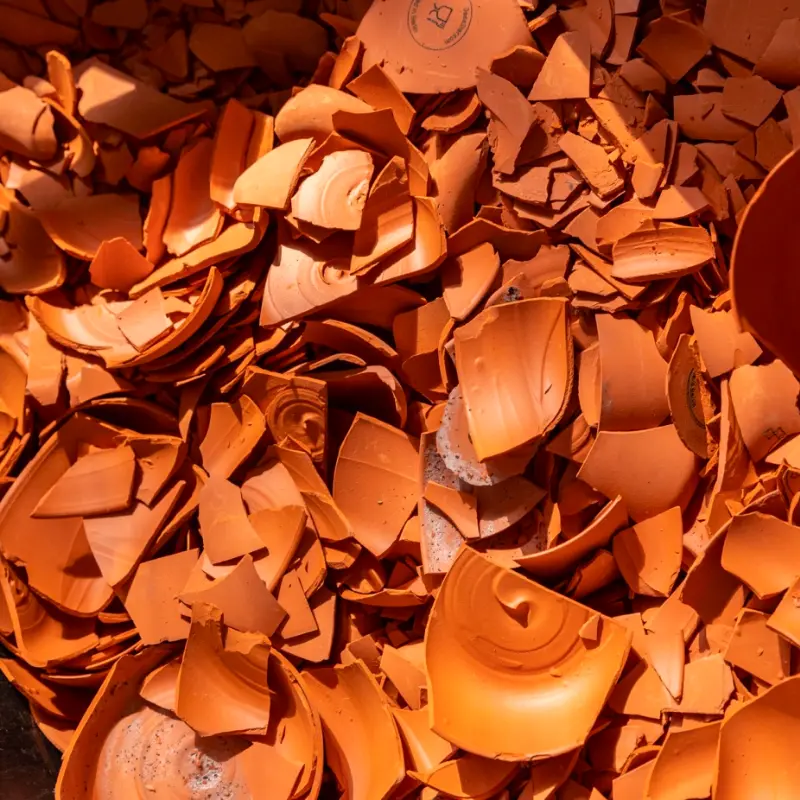 Broken clay to be recycled into new cups